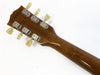 Back of mahogany guitar neck with vintage tuners and cream tuning pegs on white background for Coffee House Guitars product listing.