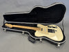 Fender Telecaster electric guitar with cream finish and maple neck in black hard shell case with plush interior