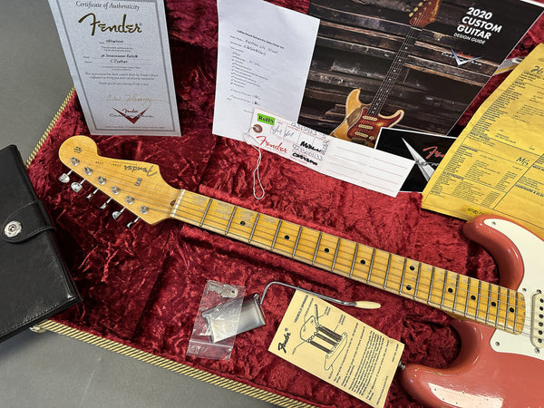 Fender 56 Stratocaster Relic electric guitar with maple neck and rosewood fingerboard in red case with certificate of authenticity, Fender tremolo springs instruction card, warranty and custom shop documents.