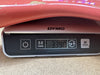 Digital DYMO scale showing weight of 3.390 kilograms for guitar measurement at Coffee House Guitars