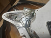 Close-up of guitar pickguard wiring and potentiometers showing internal electronics and components on sunburst electric guitar body