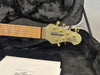Ernie Ball Music Man Albert Lee signature guitar headstock with gold tuning pegs and maple fretboard in black plush guitar case