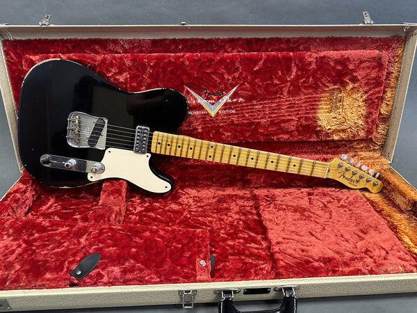 Black Fender Custom Shop Limited Edition Telecaster electric guitar with maple fretboard in open red plush-lined hard case