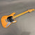 Vintage natural finish Guild Sabre I electric guitar with maple neck and black pickguard on gray background