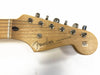 Fender Stratocaster electric guitar maple headstock with chrome tuning pegs and original contour body decal on white background