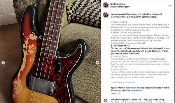 Vintage '72 Fender Precision Bass with sunburst finish, tortoiseshell pickguard, and worn, reliced body resting on a beige couch next to a black and white patterned cushion.
