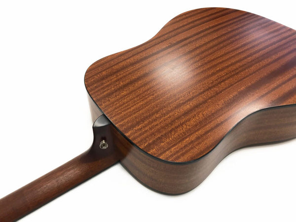 Close-up of the back and neck heel joint of an acoustic guitar with rich mahogany wood grain and strap button on white background